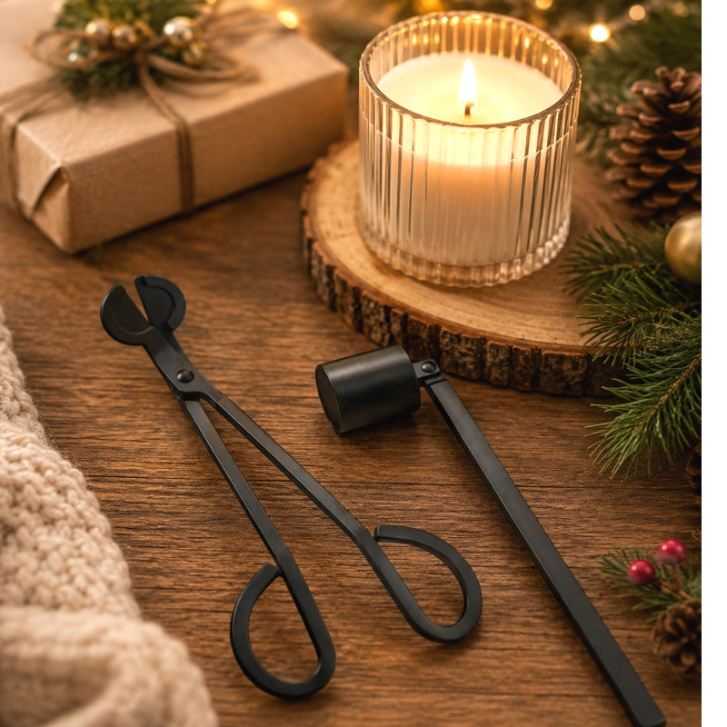 Natural Living - Candle Care Tool Set - Black (2-Piece) — candle care tools beside a candle.