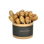 Natural Living - Wood Honey Dippers (24-Pack) — countertop display of 24 honey dippers.