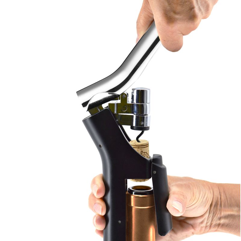 Natural Living - Opera - Vertical Lever Corkscrew — corkscrew lever in use.