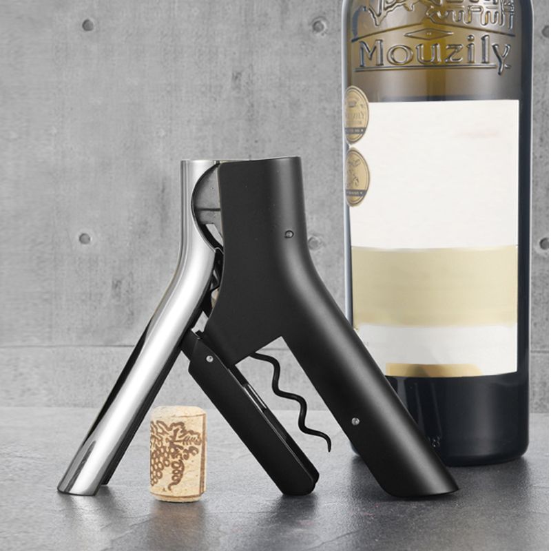 Natural Living - Opera - Vertical Lever Corkscrew — lever corkscrew and wine bottle.
