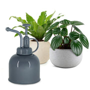 Natural Living - Plant Mister - Grey — grey plant mister with plants.