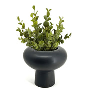 Natural Living - Mushroom-Shaped Planter - Black — planter with a plant.
